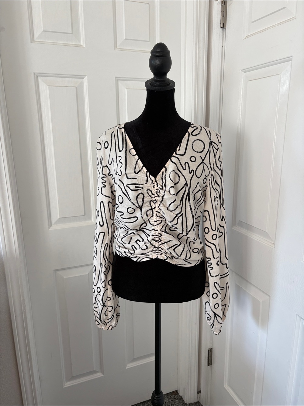 Everly Cream and Black Abstract V-Neck Ruched Blouse